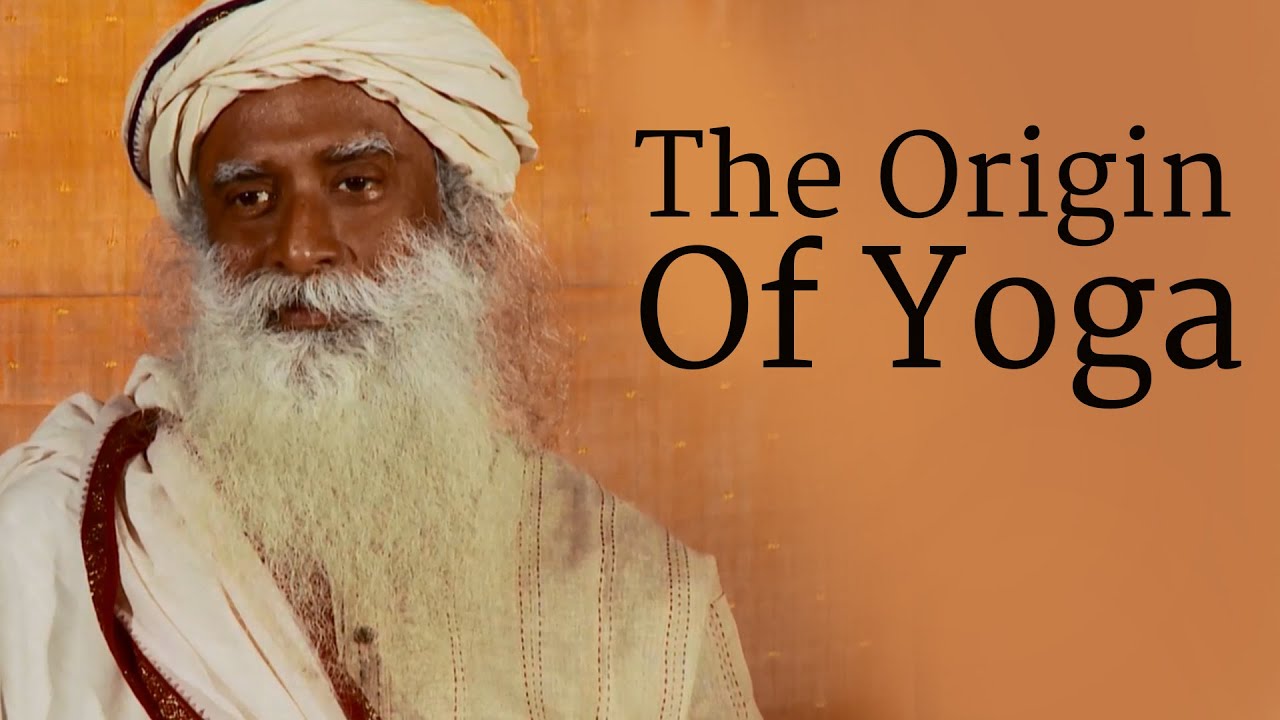 Sadhguru in a saffron turban looking at the camera; text overlay reads: The Origin Of Yoga.